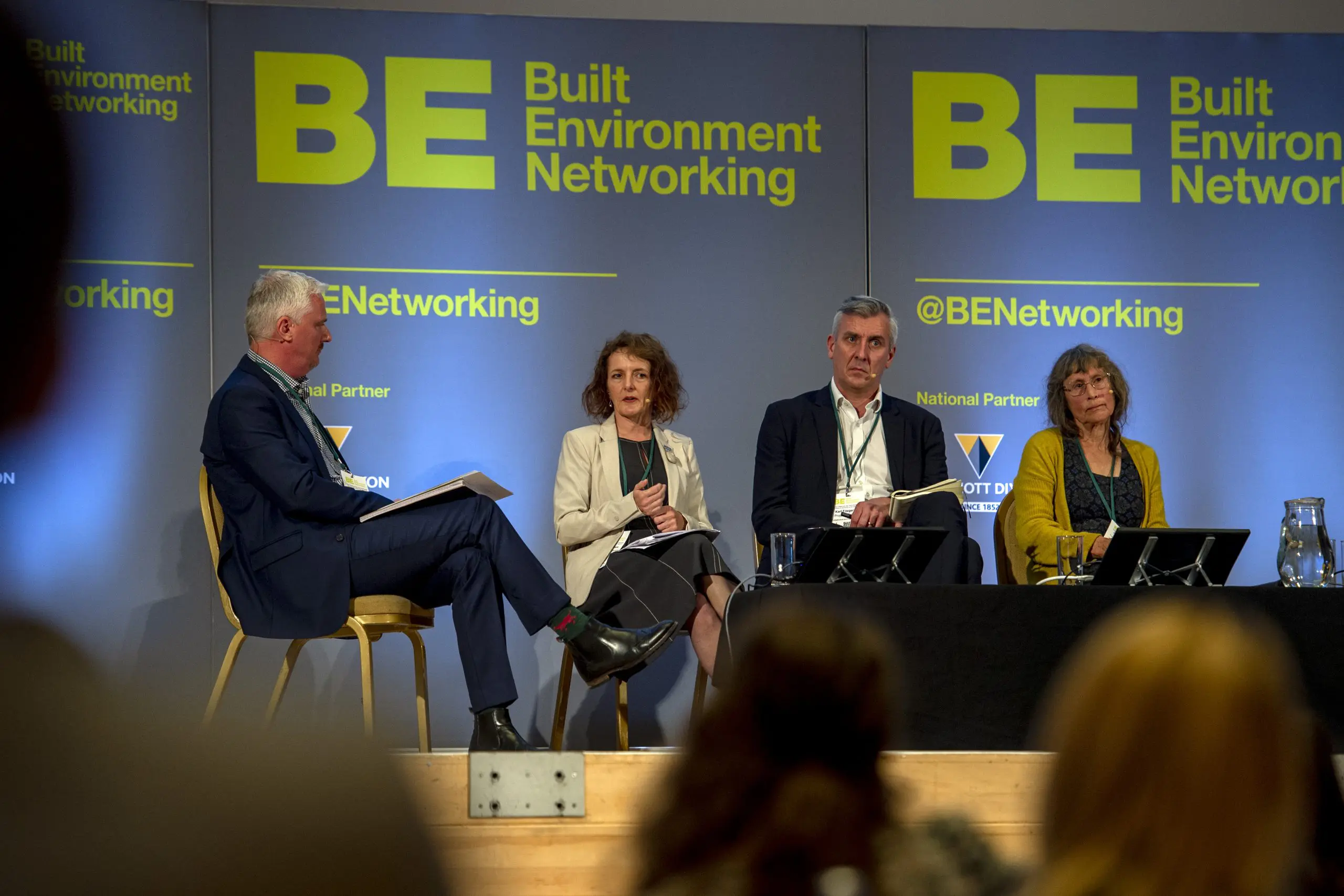 people sitting at a panel