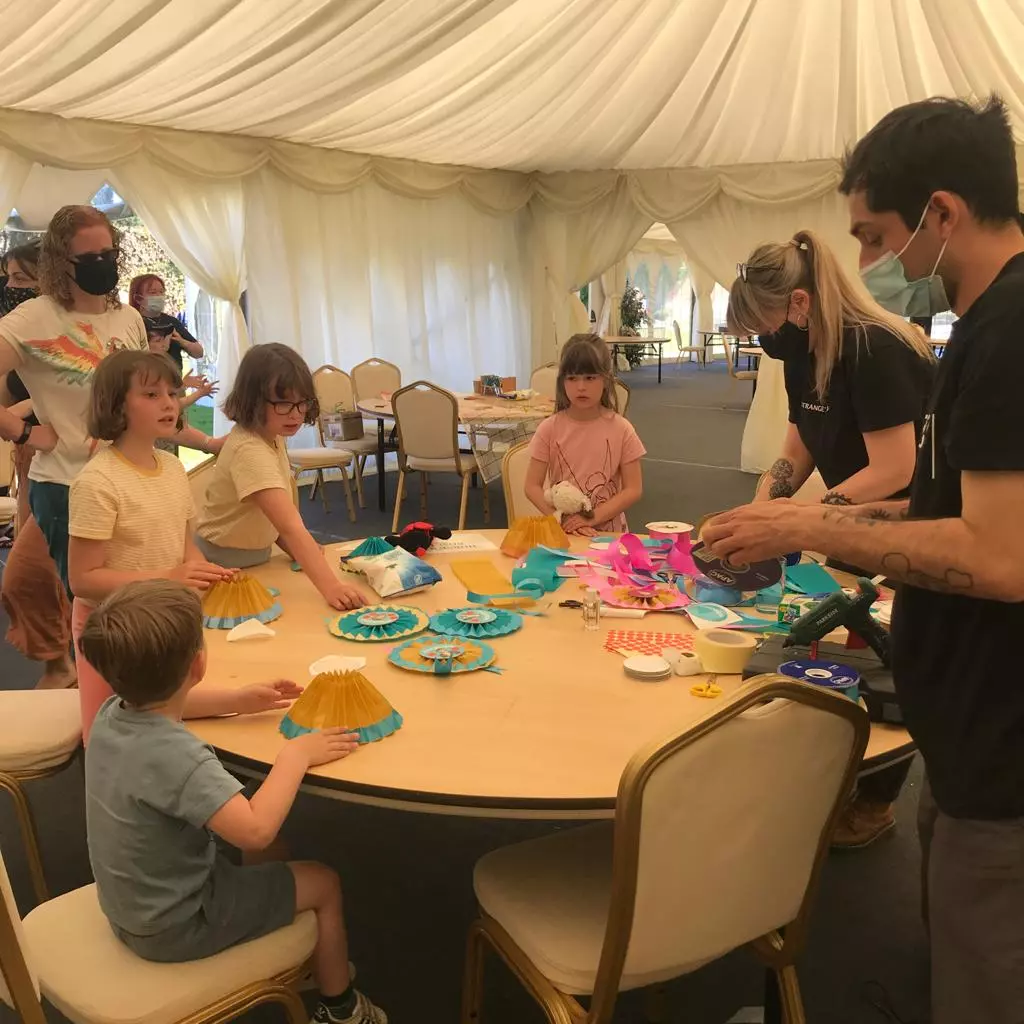 kids at a craft table